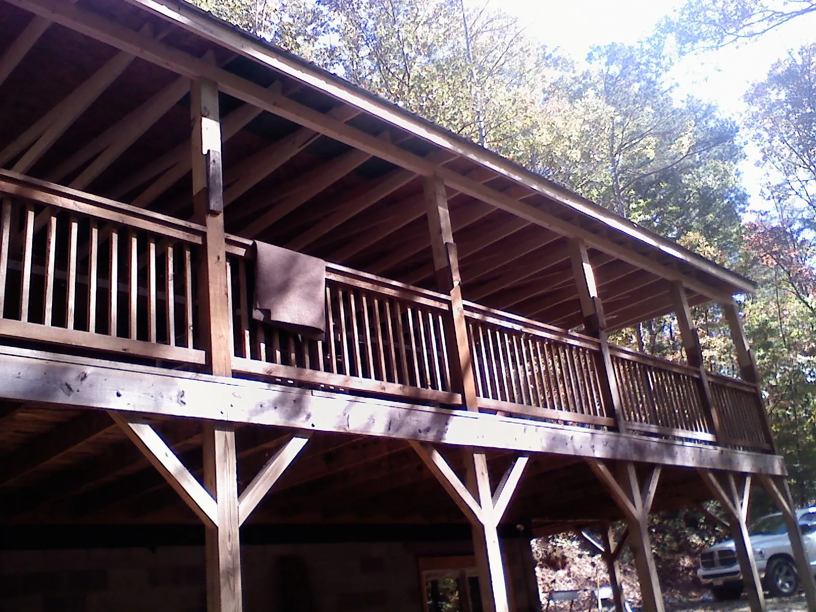 Timber framing under a new elevated porch and deck — Roof Leak Repair in Old Monroe by Roofing Brothers